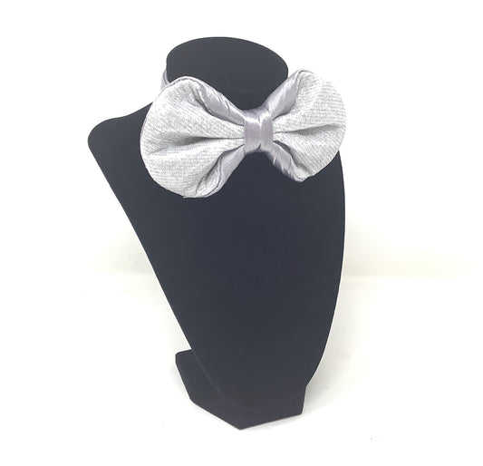 Silver Eclipse Bow Tie

Shimmering silver finish with satin center.
Handcrafted and pre-tied with adjustable strap.
Lightweight with an elegant glow
Perfect for weddings, anniversaries, and modern evening wear.