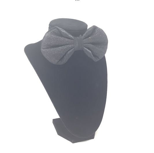 Obsidian Luxe Bow Tie

Shimmering black finish with satin base
Handcrafted, pre-tied, and adjustable
Sleek, versatile, and sophisticated design
Ideal for black-tie events, galas, and luxury occasions