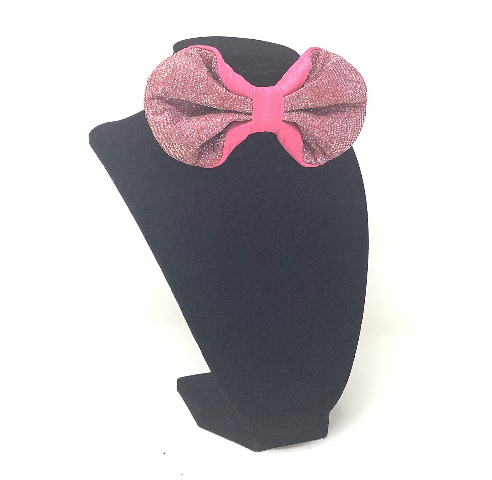Rose Spark Bow Tie

Sparkling pink finish with satin trim.
Handcrafted and pre-tied with an adjustable strap.
Bold, lively, and stylishly unique.
Great for weddings, parties, and standout fashion.